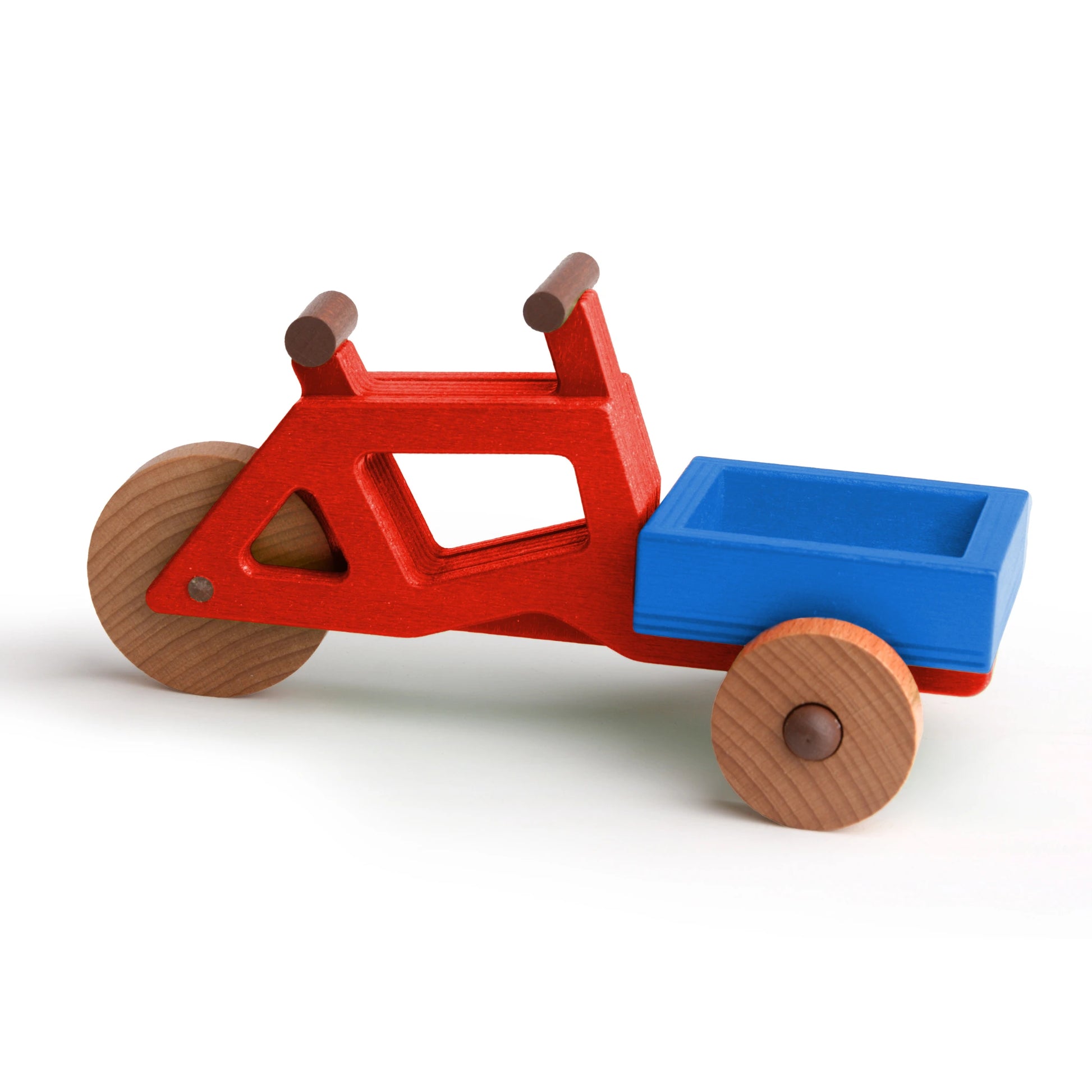 Modular toy cargo bike made of sustainable wood, featuring red and blue design, promoting creative play and mobility for kids.