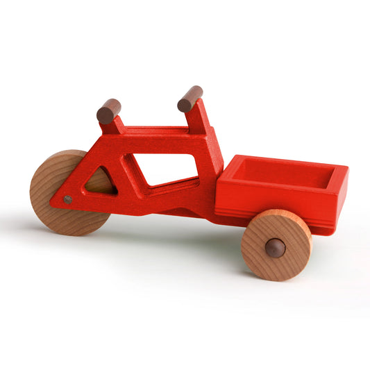 Modular wooden cargo bike toy in red, made from sustainable wood, promoting creative play and eco-friendly values.