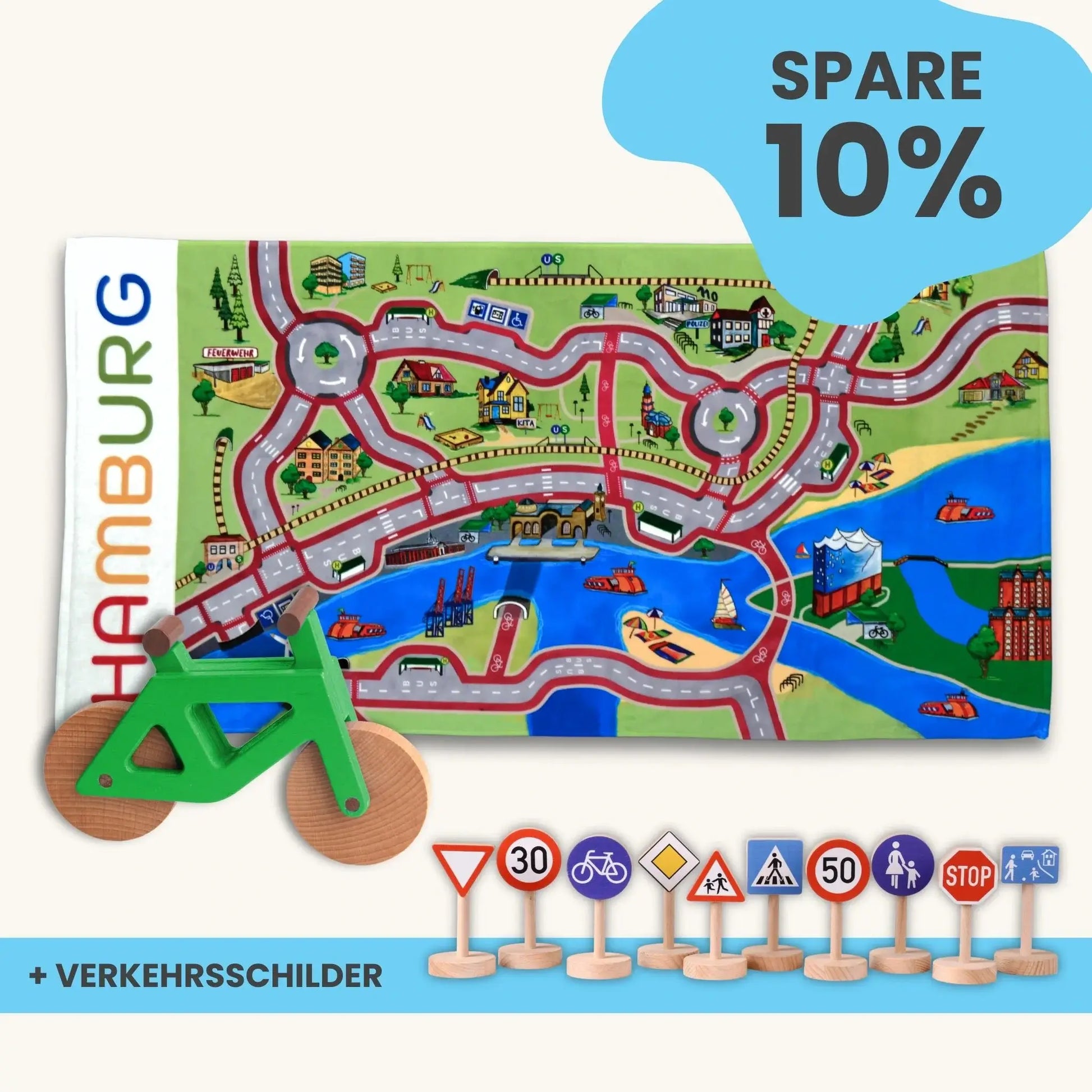 Handtuch Maxi Mobilitätsset To Go with Spielteppich, wooden bicycle, and traffic signs for kids' play.