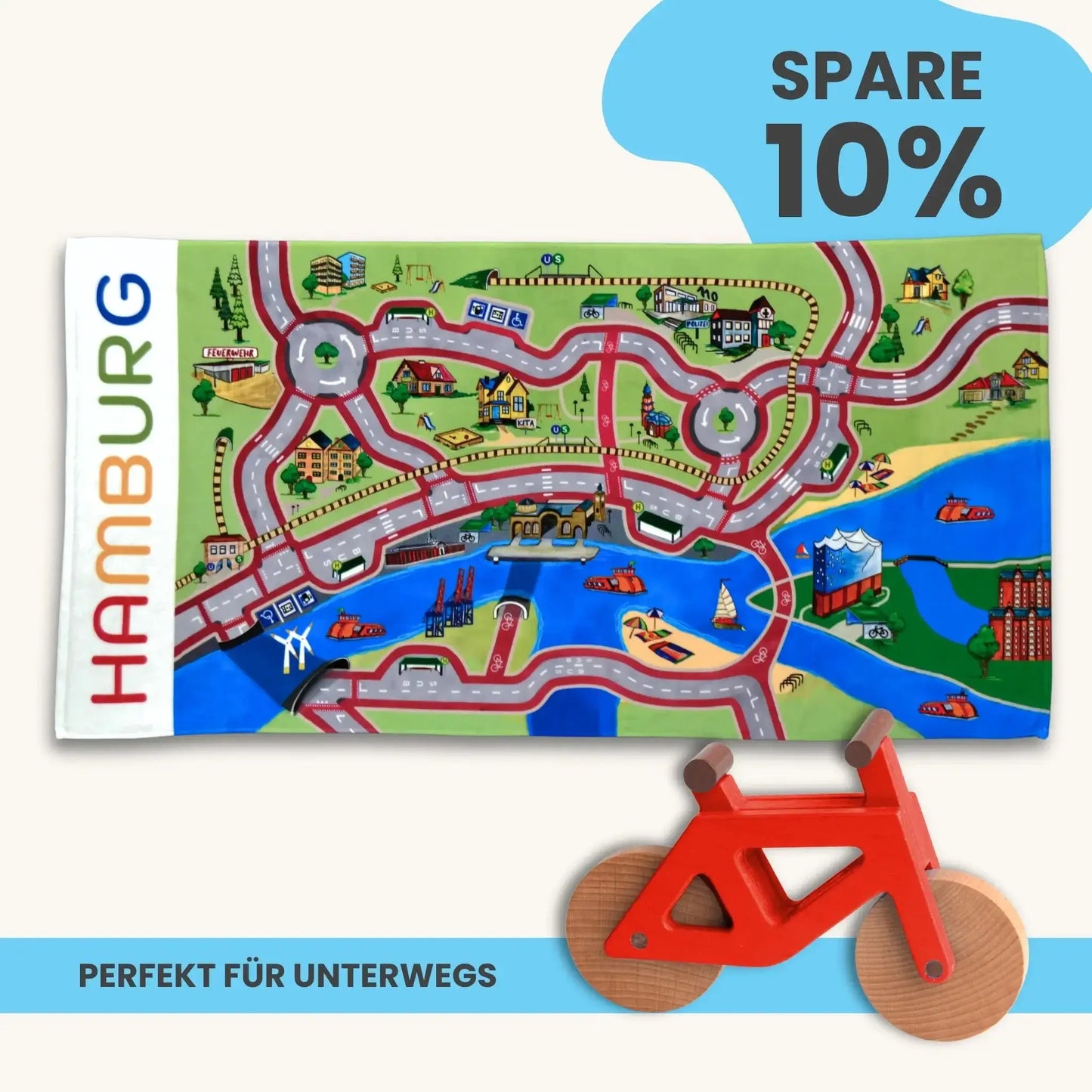 Handtuch Mobilitätsset To Go mit Spielteppich und Holzfahrrad, perfekt für unterwegs und nachhaltig, Made in Germany.