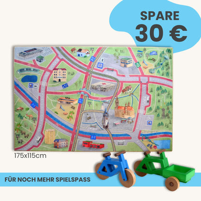 Spielteppich Freiburg 175x115cm mit Stadtmotiven und Spielzeugfahrzeugen im Starter-Set.